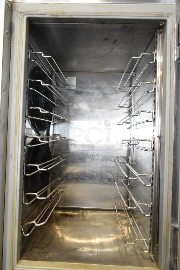 Randell BC-18 stainless steel commercial blast chiller, interior view, racks and fan visible, 115/230 volts, 1 phase.