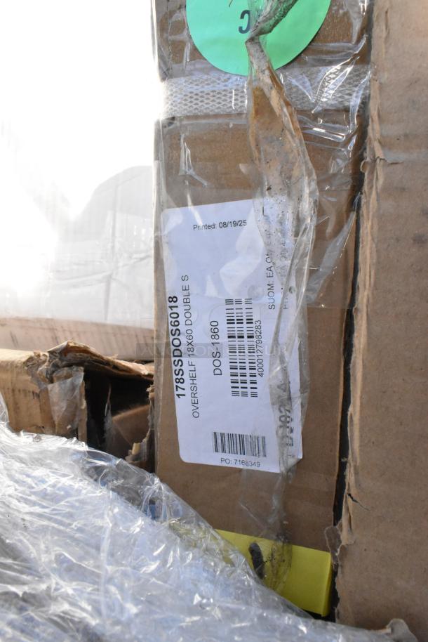 Boxed Avantco 178SSDOS6818 stainless steel double deck overshelf, 18"x67.9", new with scratch and dent packaging visible.