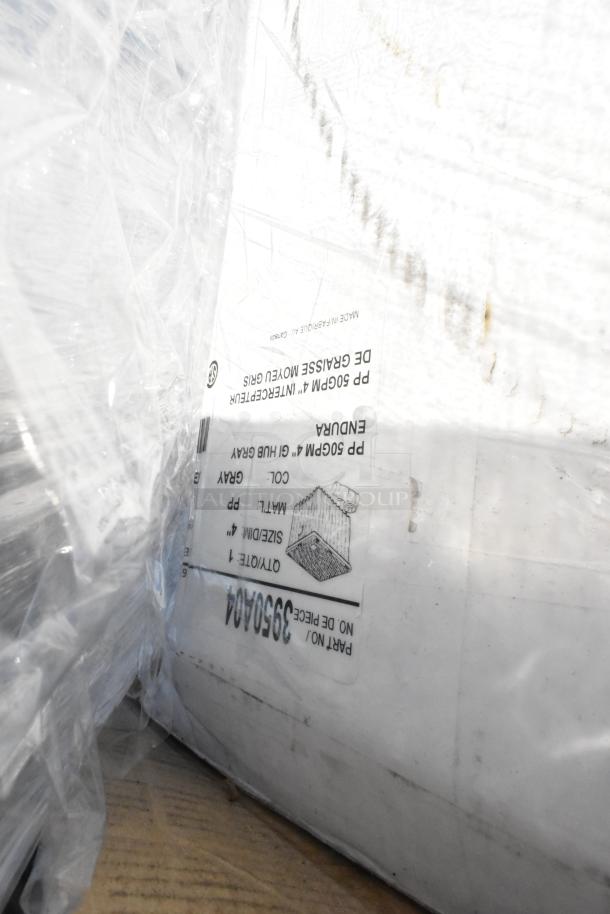 Lot of various brand new scratch and dent items wrapped in plastic, including labeled packaging indicating part number 3950A04.