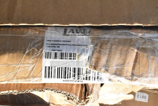 Cardboard box with visible label showing "LAVE" and details for an industrial workbench, 30x60, 12ga steel top.