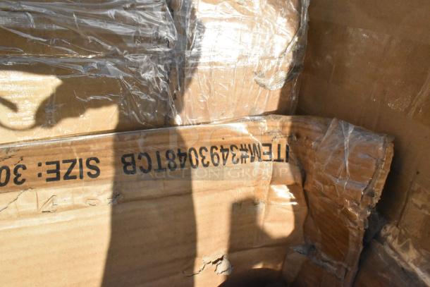 Damaged cardboard box containing a lot of various items, including a pan rack, shelf, and tabletop. Item#3493048 visible.