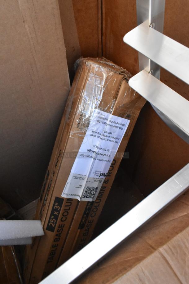 Box containing new scratch and dent items including a pan rack and shelf, visible with labels and packaging intact.