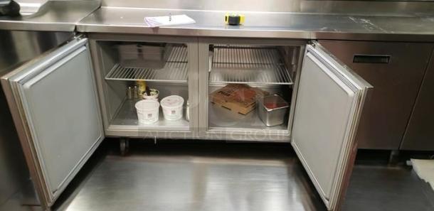 True TPP-93D-4 refrigerated pizza prep table, 93", 3-door with drawers, open doors showing interior, great condition, 115V.