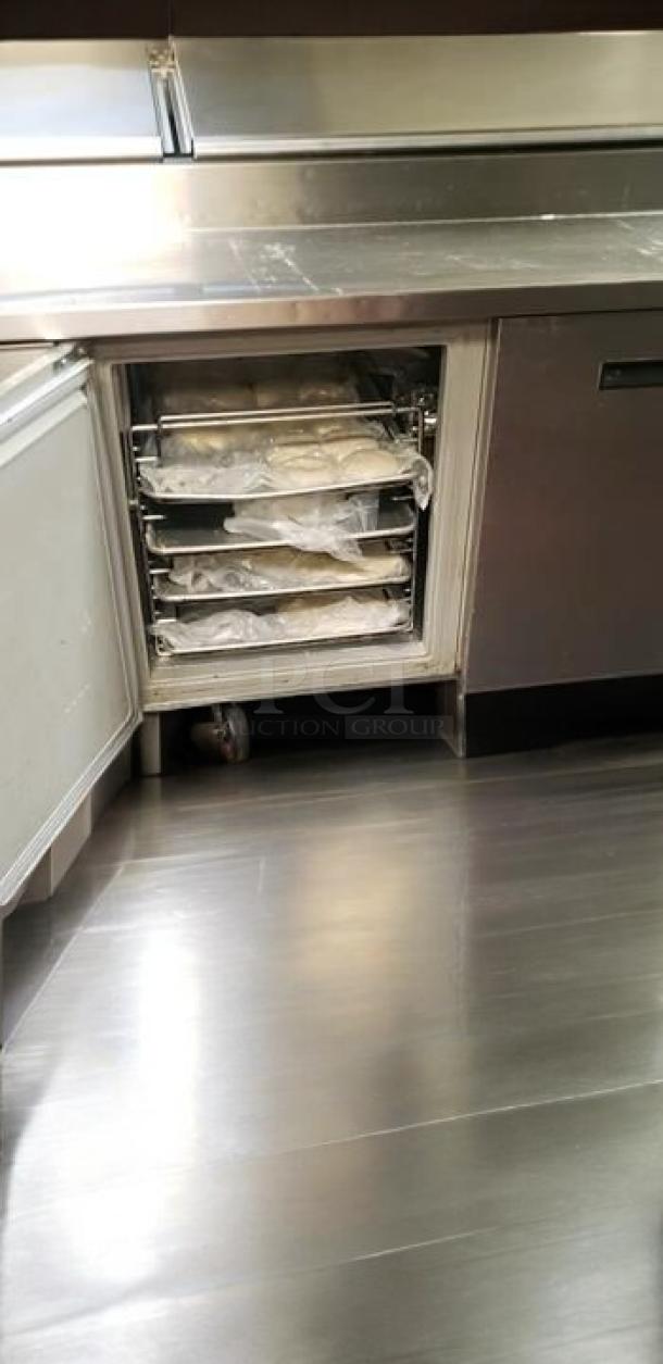True TPP-93D-4 refrigerated pizza prep table, 93", 3-door with drawers, stainless steel, great condition, tested working.