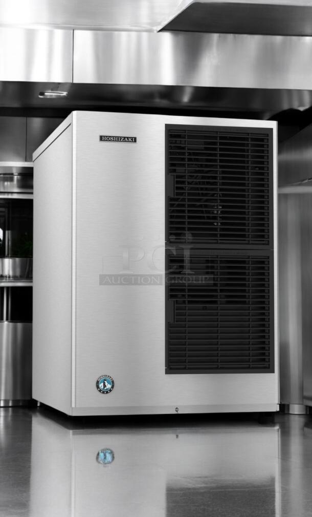 Hoshizaki KM-500MAJ ice machine with bin, excellent condition, 115V, tested and working, crescent cube model, stainless steel finish.