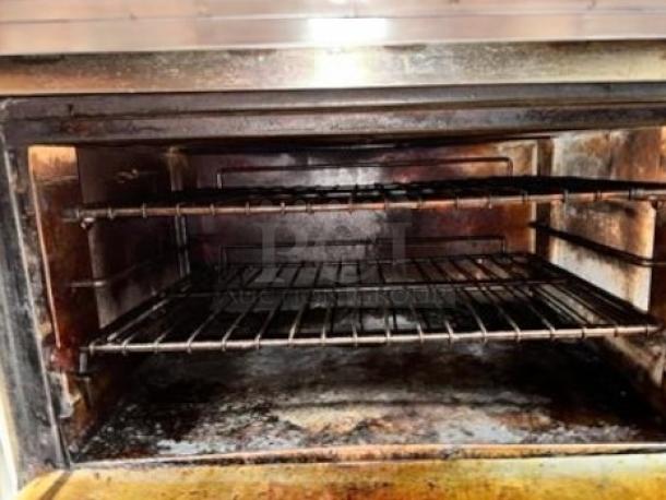 Southbend 4601DD 10-burner gas range, open oven showing interior condition, racks, tested and working, natural gas.