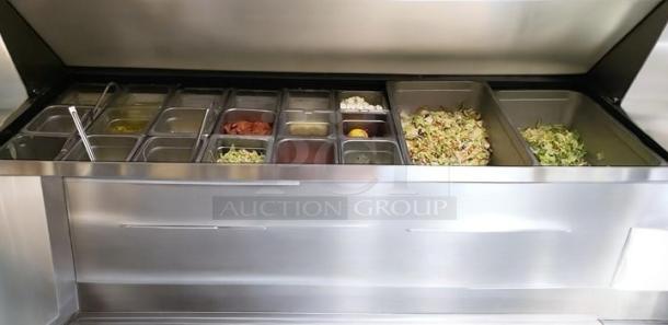 True TSSU-72-18 3-Door Sandwich/Salad Prep Refrigerator, stainless steel, 72" wide, multiple ingredient containers, excellent condition.