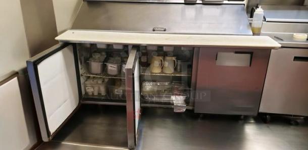 True TSSU-72-18 sandwich/salad prep refrigerator, 3-door, 72" wide, excellent condition, 115V, fully tested, visible shelving.