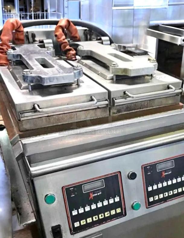 Superb condition Garland Xpress Grill XE36, dual platen, electric, 208/240V, fully tested, stainless steel finish.