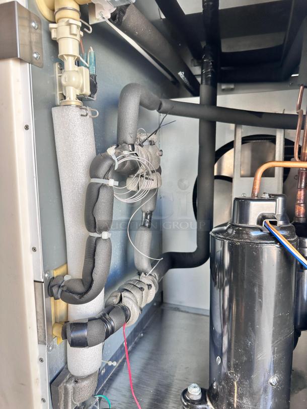 Superb condition Scotsman BLMI-850A ice machine interior, 2018 model, tested, 230V, visible wiring and components.