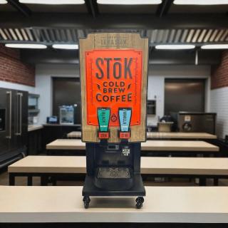 CreaMiser 230 STōK Cold Brew Dispenser, dual product, 110V, fully tested, excellent condition, wooden panel design.