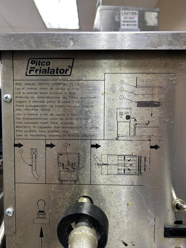 Pitco P14 portable fryer oil filter machine in excellent condition, 55 lb capacity, 120V, with operating instructions visible.