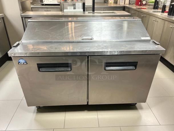 Great condition Blue Air BAPT60 60" prep table, stainless steel, tested and working, features dual doors and sturdy design.