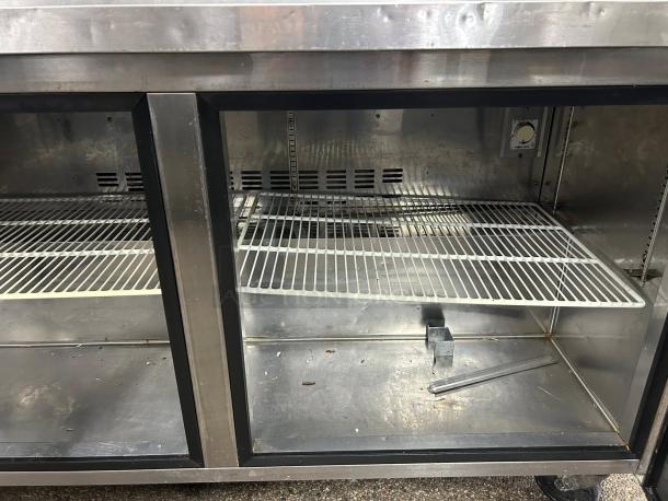 Blue Air BAPT60 60" stainless prep table, great condition, clean interior, wire shelving, tested and working.