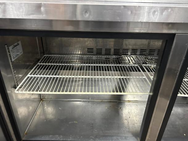 Blue Air BAPT60 60″ prep table in great condition. Features include a spacious interior and shelving. Tested and working.