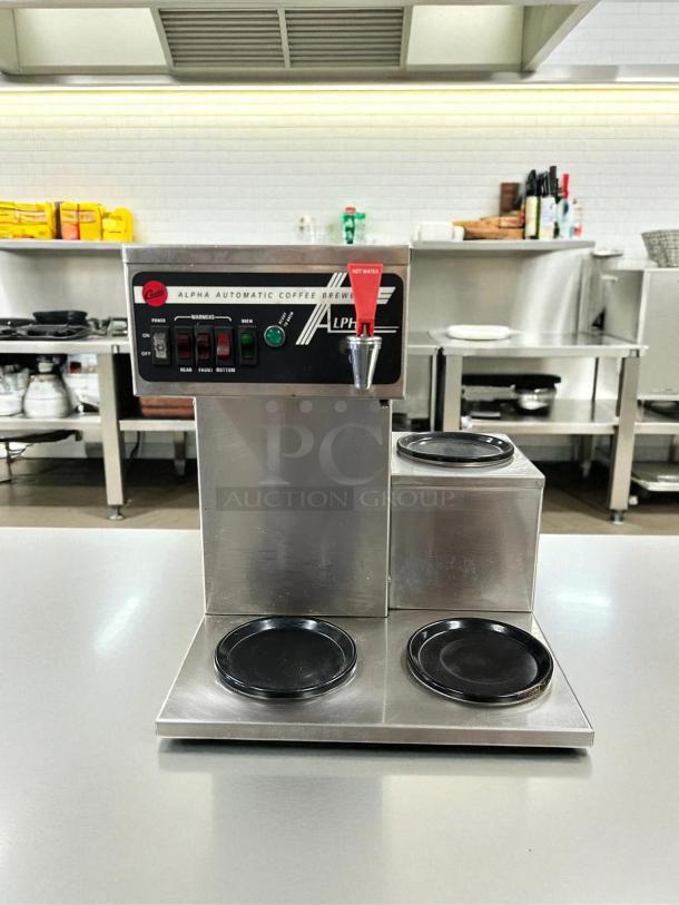 Curtis ALP3GTR12A000 12 Cup Coffee Brewer with 3 lower warmers on right, stainless steel, tested and working, 120V.