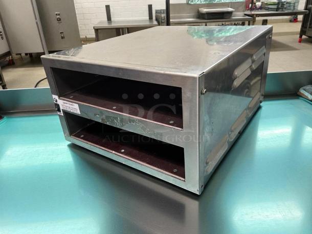 Henny Penny MPC22.05 modular warming drawer, 14 3/4"W with 4 compartments, stainless steel, tested and working, 120v.