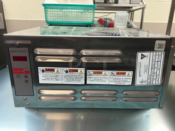 Henny Penny MPC22.05 modular warming drawer, 14 3/4"W, 4 compartments, 120v, stainless steel, tested and working.