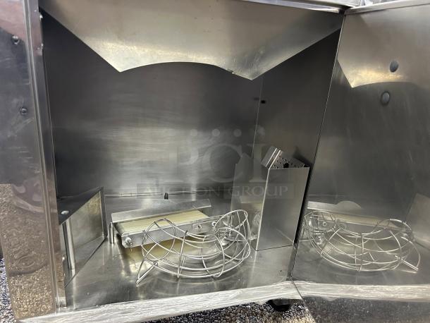 Citrocasa 8000 SB-ATS Advance citrus juicer, excellent condition, stainless steel interior, visible components, sold as is.