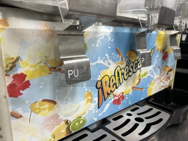 Crathco D35-4 Grindmaster Classic Bubbler, pre-mix cold beverage dispenser. Bright graphics, labeled "Push." Tested and working.