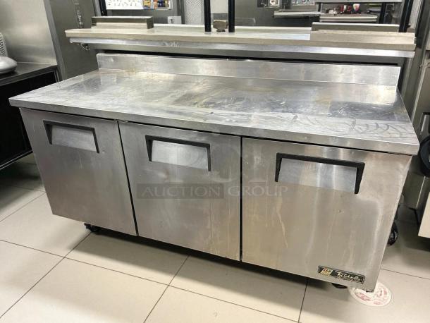 True TWT-72-HC stainless steel 3-section worktop refrigerator, 19 cu. ft., great condition, tested and working, visible branded label.