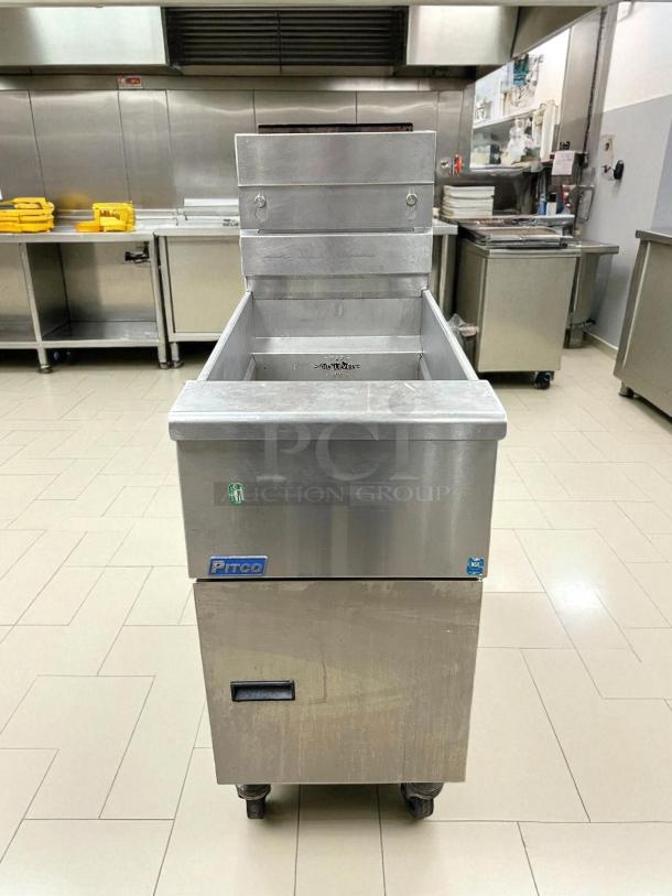 Pitco SG14-S natural gas fryer, 40-50 lb capacity, stainless steel, floor model, tested and working, good condition.