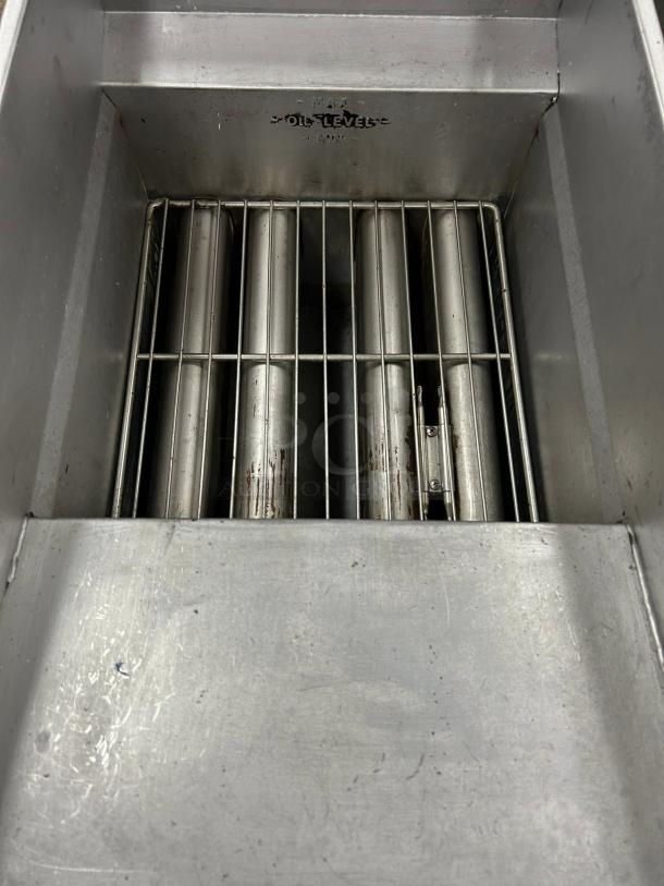 Pitco SG14-S natural gas stainless steel floor fryer, 40-50 lb. capacity, visible oil level marks, tested and working.