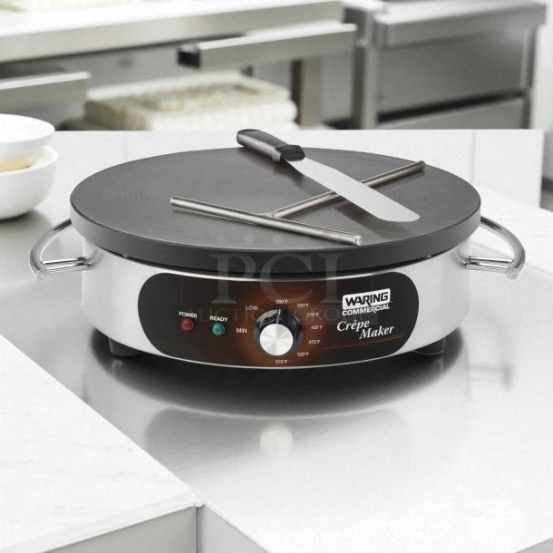 Waring WSC160X 16" electric crepe maker in excellent condition, tested and working. Features adjustable temperature control.