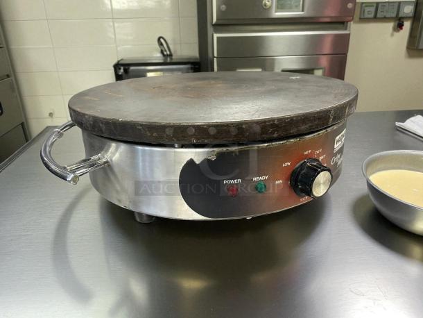 Waring WSC160X 16" electric crepe maker in excellent condition, stainless steel with control knob and power indicators.