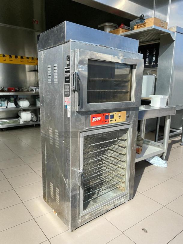 NUVU SUB-123P oven proofer in great condition, 220v 3ph. Stainless steel with visible control panel and racks. Tested and working.