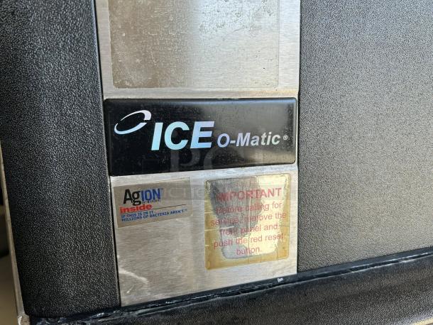 Ice-O-Matic ICE0500HW ice machine label showing brand name and warning sign, tested and working condition.