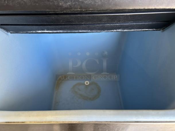 Ice-O-Matic ICE0500HW ice machine interior showing clean, blue compartment. Tested, working condition.
