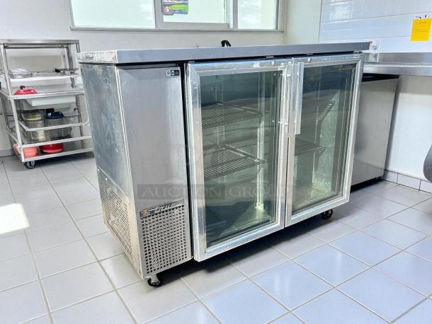 True TBB-24-48G-HC-LD 49" glass-door back bar cooler in excellent condition, stainless steel, tested and working.