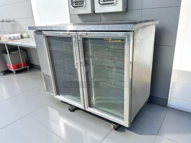 True TBB-24-48G-HC-LD 49" back bar cooler, excellent condition, two glass doors, tested and working.