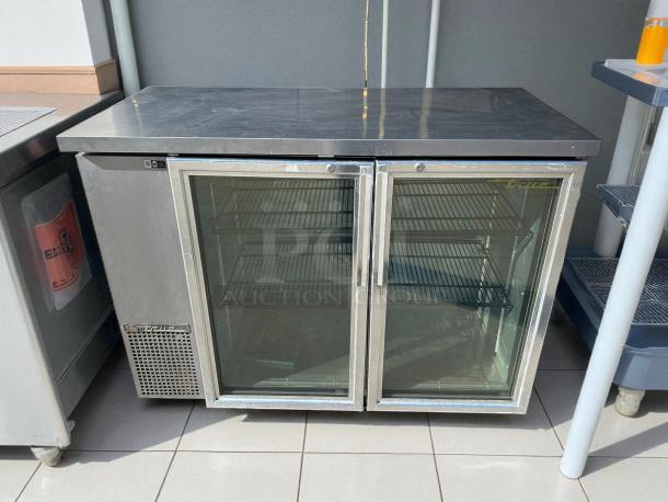 True TBB-24-48G-HC-LD back bar cooler, 49", stainless steel, double glass doors, excellent condition, tested and working.