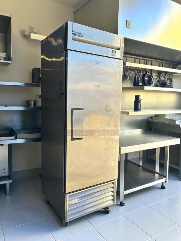 True TS-23F-HC 27" reach-in freezer, one solid right-hinge door, 115v, tested and working, stainless steel, in kitchen setting.