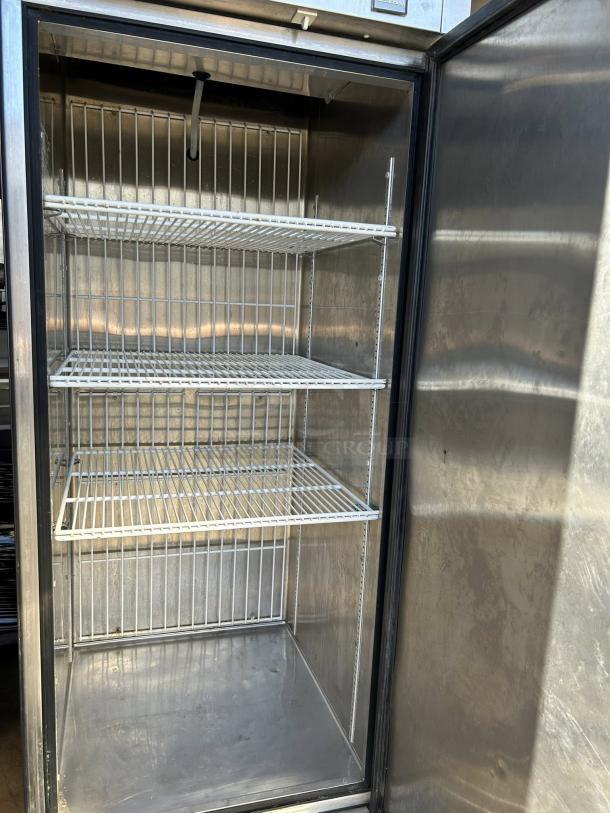 True TS-23F-HC 27" reach-in freezer, single right hinge door, three shelves, stainless interior, tested and working condition.