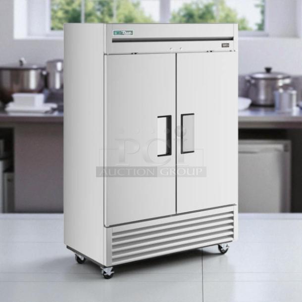 True T-49-HC 54" reach-in refrigerator, solid doors, tested, excellent condition, features sturdy handles and casters.