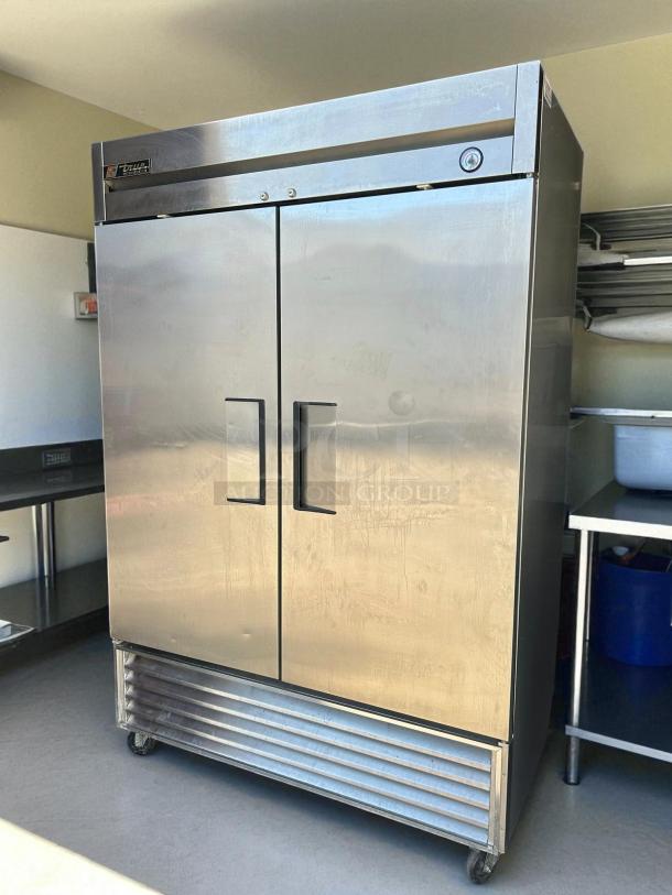 True T-49-HC 54" reach-in refrigerator, double solid doors, stainless steel, tested, on casters, excellent condition.