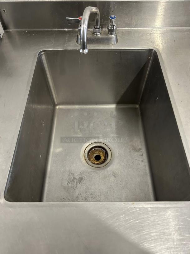 GSW USA WT-PS3072R 72" work table with prep sink, 16-gauge stainless steel, polished finish, dual faucet handles, used condition.
