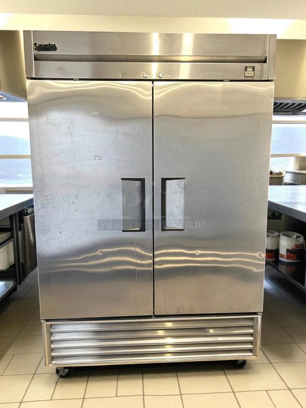 True TS-49-HC 54" 2 Section Reach-In Refrigerator in stainless steel, tested and working; clean, double door, commercial use.