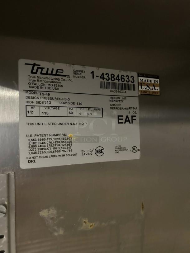 True TS-49-HC 54" 2-section reach-in refrigerator label, showcasing model, serial number, energy-saving features, and NSF listing.