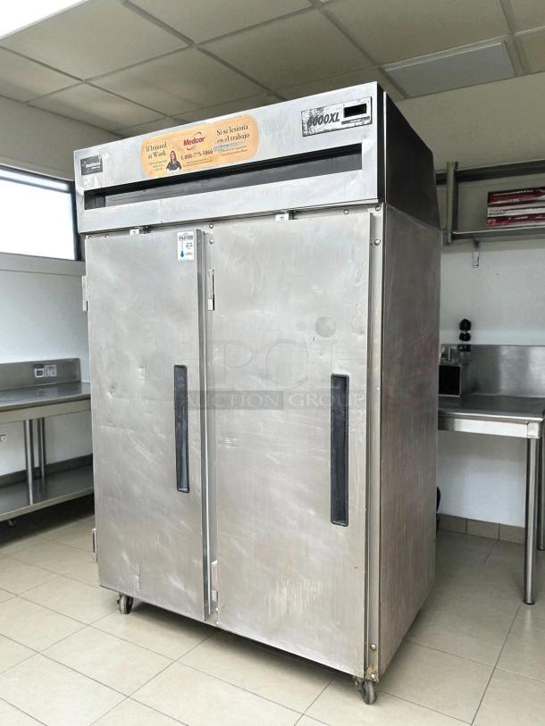Delfield 6151XL-S 50" two-section reach-in freezer in excellent condition, tested and working, with full doors and visible labeling.