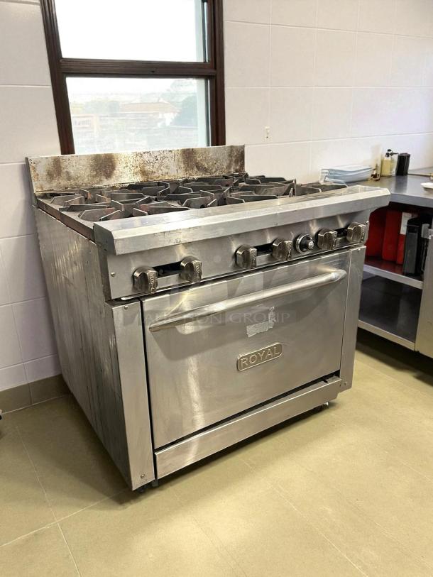 Royal Range RR-6, 6-burner 36" gas range in excellent condition, fully tested. Stainless steel with front control panel.