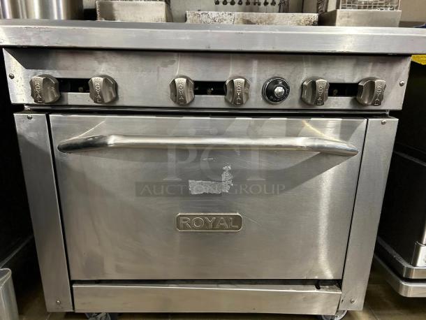 Royal Range RR-6, 36" commercial gas range with 6 burners, excellent condition, tested and working, stainless steel body.