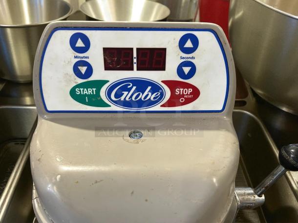 Globe SP20 20 Quart Counter-Top Planetary Mixer, control panel with digital timer, start/stop buttons visible.