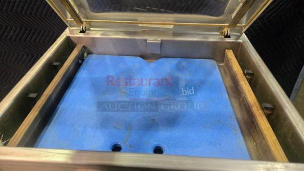 Koch Model K918-3 chamber vacuum sealer in superb condition, features stainless steel chamber, blue interior, fully tested, 220V.