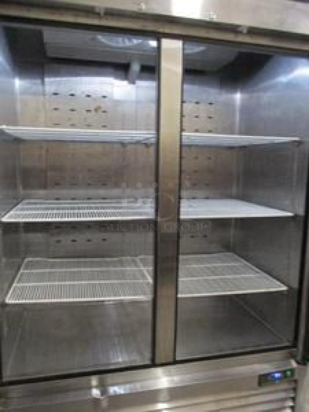 Atosa MBF8507GR 54" two-section reach-in refrigerator with solid doors, excellent condition, fully tested and working.