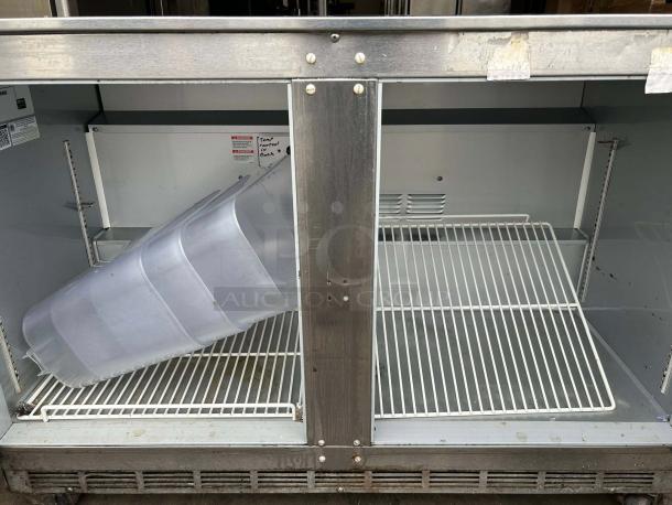 Beverage Air UCR48AHC 48" undercounter refrigerator in great condition, features two sections, tested and working.