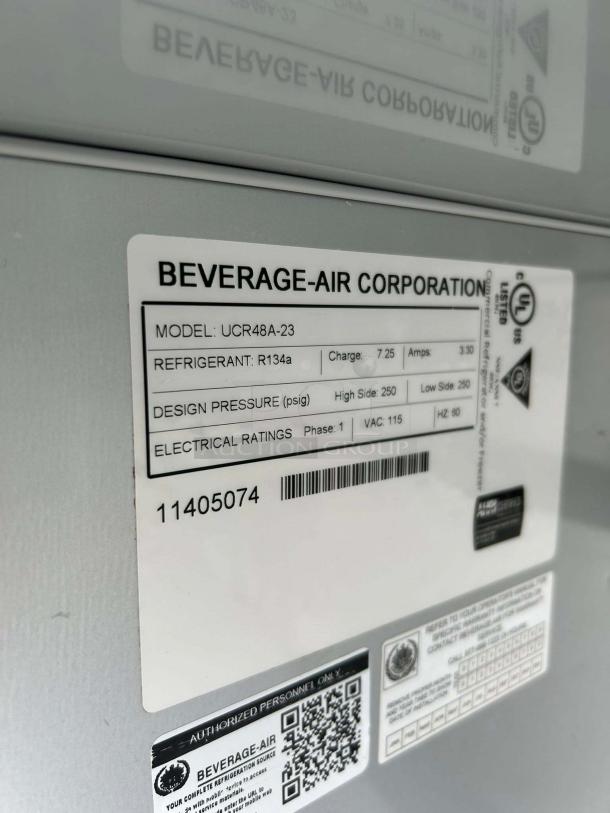 Beverage Air UCR48AHC Refrigerator label showing model, refrigerant, design pressure, and electrical ratings.